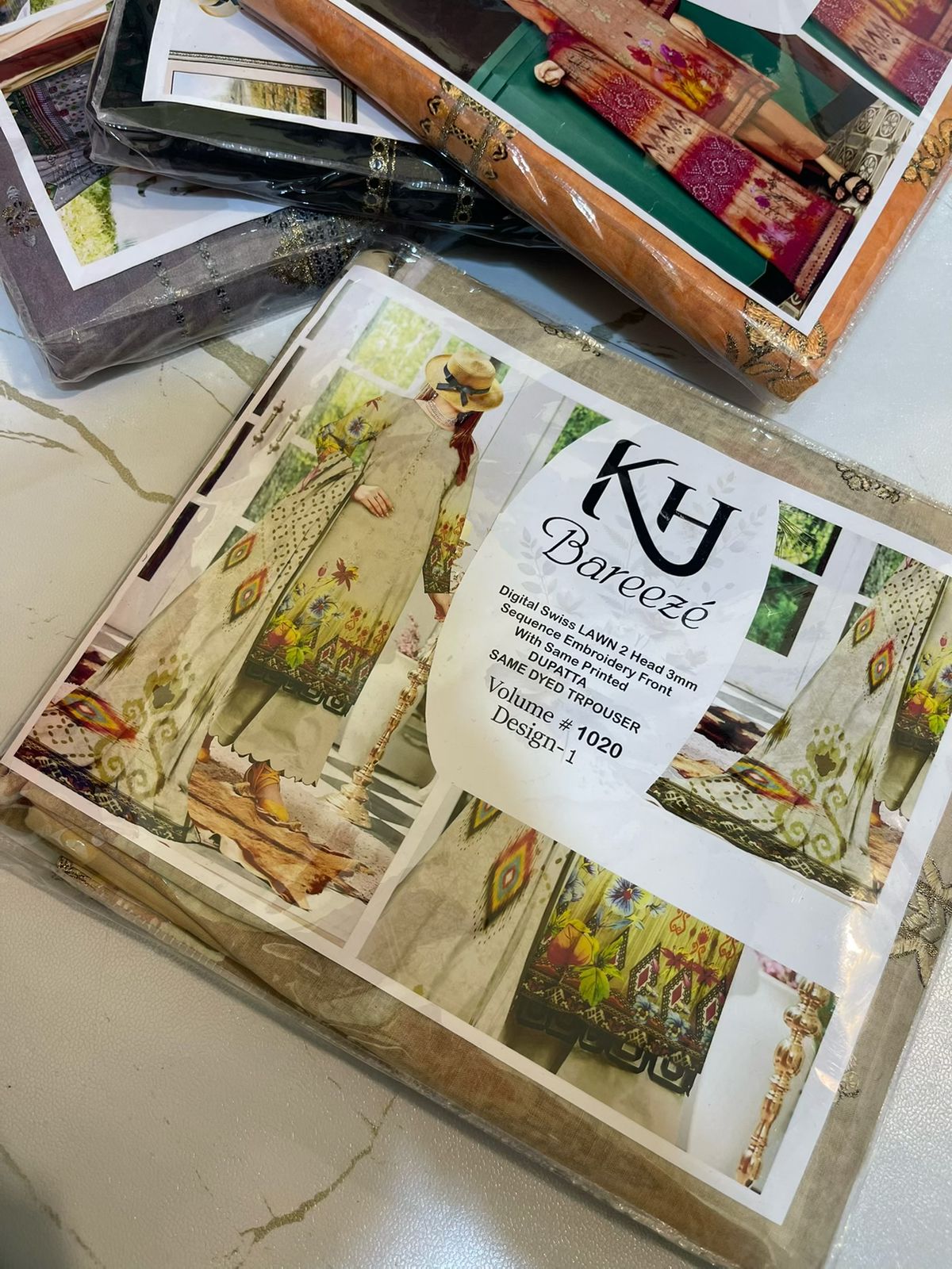 KH Bareeze 3 Piece Digital Lawn Suit – Heavy Sequence Embroidery | Summer Collection